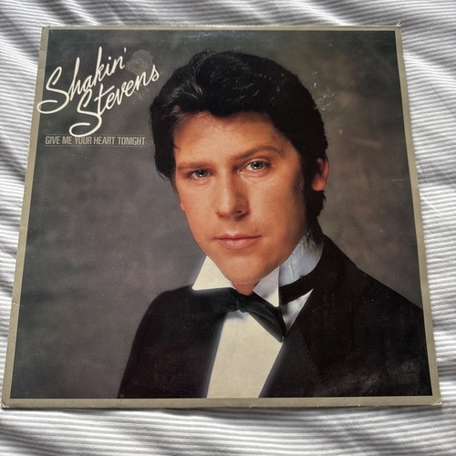 Shakin stevens give your - shakin,